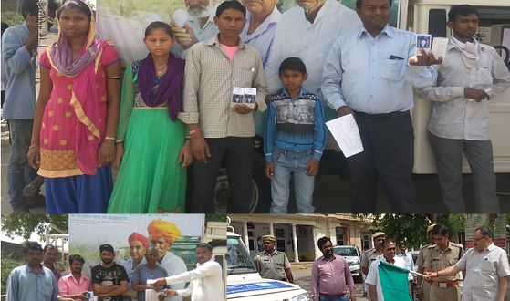 Distribution of energy efficieny buls rural areas Sawai Madhopur Rajathan flag collector sp