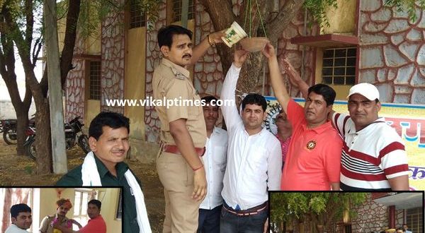 Wazirpur Police hanging water pot for birds occasion Rajasthan police Day Foundation day