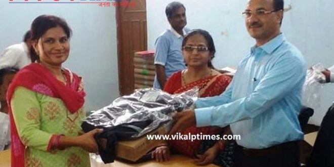 Collector distributed Laptop gram panchayat governent rajasthan School Feeding Data students