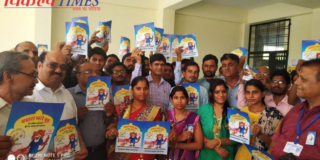 Stickers Padharo Mhare booth distributed youth