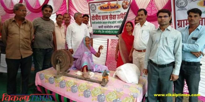 People saw live demo mo of spinning wheel Khadi festival exhibition