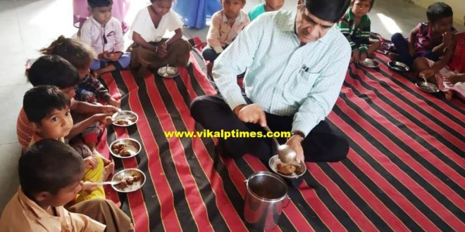 Collector fed nutrition food aanganwadi children