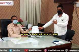 cheque handed collector Corona virus
