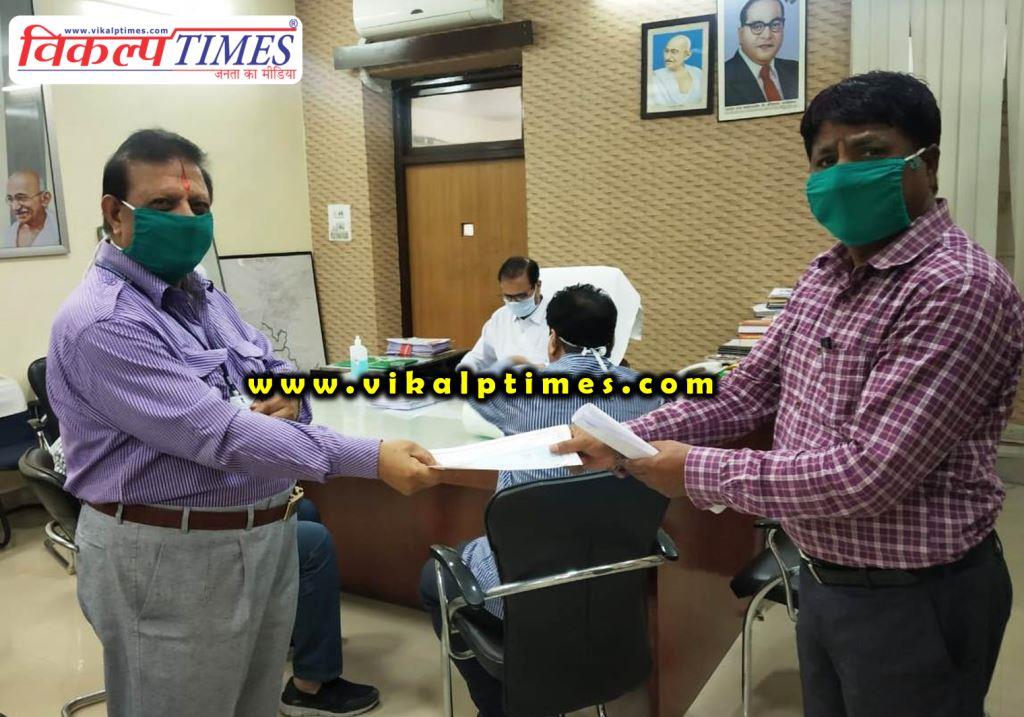 Bhamashah handed over cheque of cooperation deal corona virus crisis