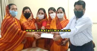 Mahila Mandal handed over cheque cooperation amount coron relief fund