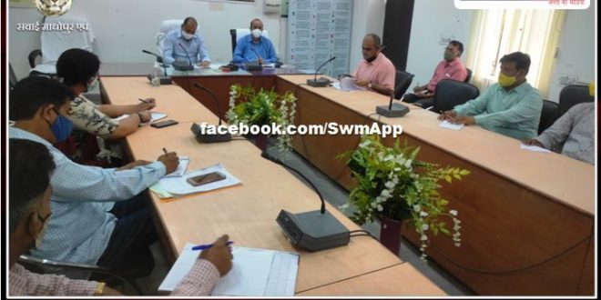 Settle the files related to land acquisition by putting up a camp : Collector