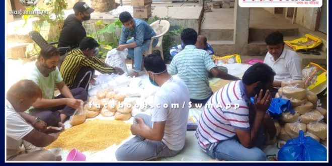 Ration material being distributed to thr needy by Khidmatgar Group in Sawai Madhopur