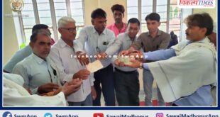 Villagers presented 13 lakh rupees for school development