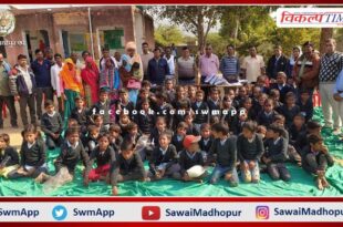 jerseys distributed to school children to protect them from cold in sawai madhopur