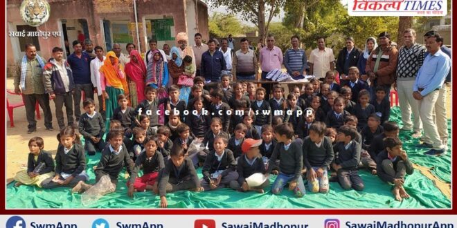 jerseys distributed to school children to protect them from cold in sawai madhopur