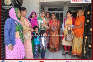 BJP Mahila Morcha distributed yellow rice and invited to attend Prime Minister narendra modi meeting