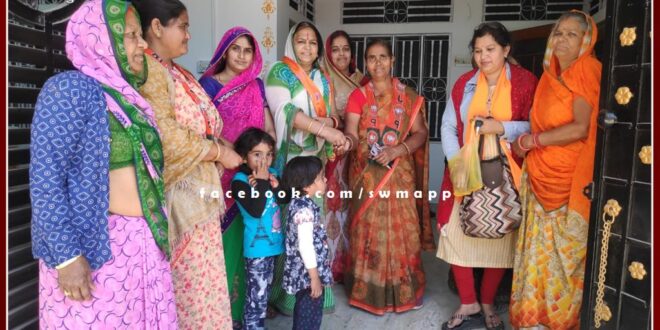 BJP Mahila Morcha distributed yellow rice and invited to attend Prime Minister narendra modi meeting