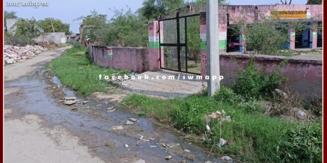 Situation of filth in front of the gate of Bairada Government School