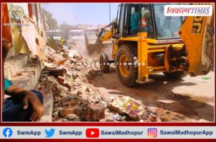 Yellow paw on houses for road widening in bamanwas