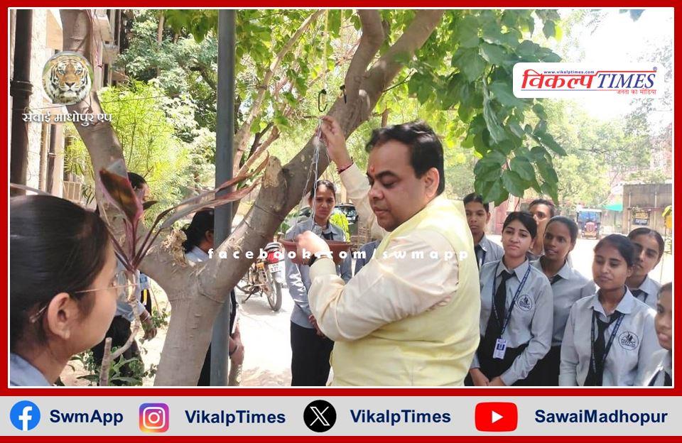 Chief Government Secretary of Technical Education Department tied water pot for birds.