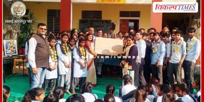 Class 12 students presented smart TV to the school
