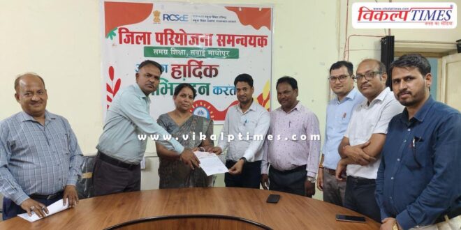 A check of 81 thousand was handed over for school development in sawai madhopur